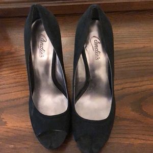 Black suede peep toe pumps
